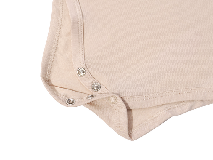 Close up shot of Lollibly Organic Bamboo Short Sleeve Baby Onesie Snap Closure