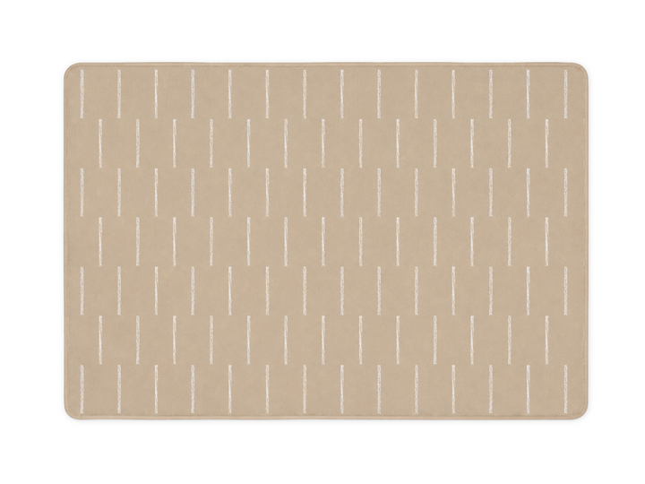 Lollibly Shortbread Plush Playmat in XL (300 × 200 cm). A rectangular beige mat with rounded corners, featuring a repeating pattern of thin vertical white lines.